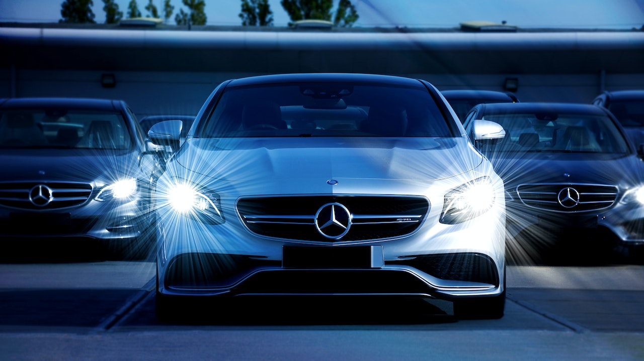 Mercedes Benz with headlights on